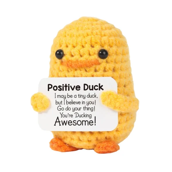 Yellow crochet duck gift holding a positive message card