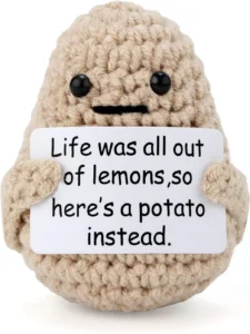 Crochet potato gift holding a personalized message card