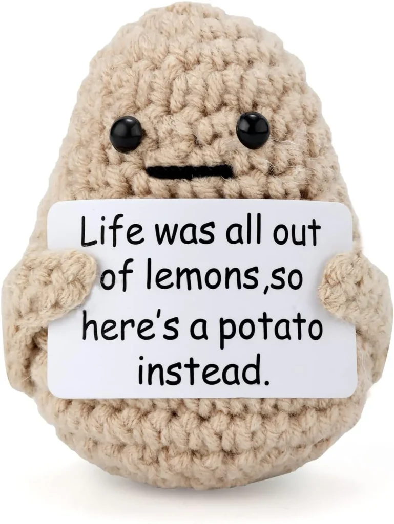 Crochet potato gift holding a personalized message card