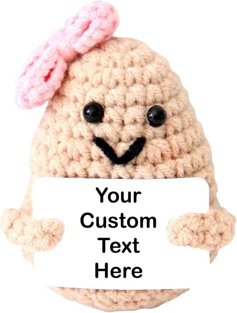 Beige crochet potato with a pink bow holding a white customizable message card
